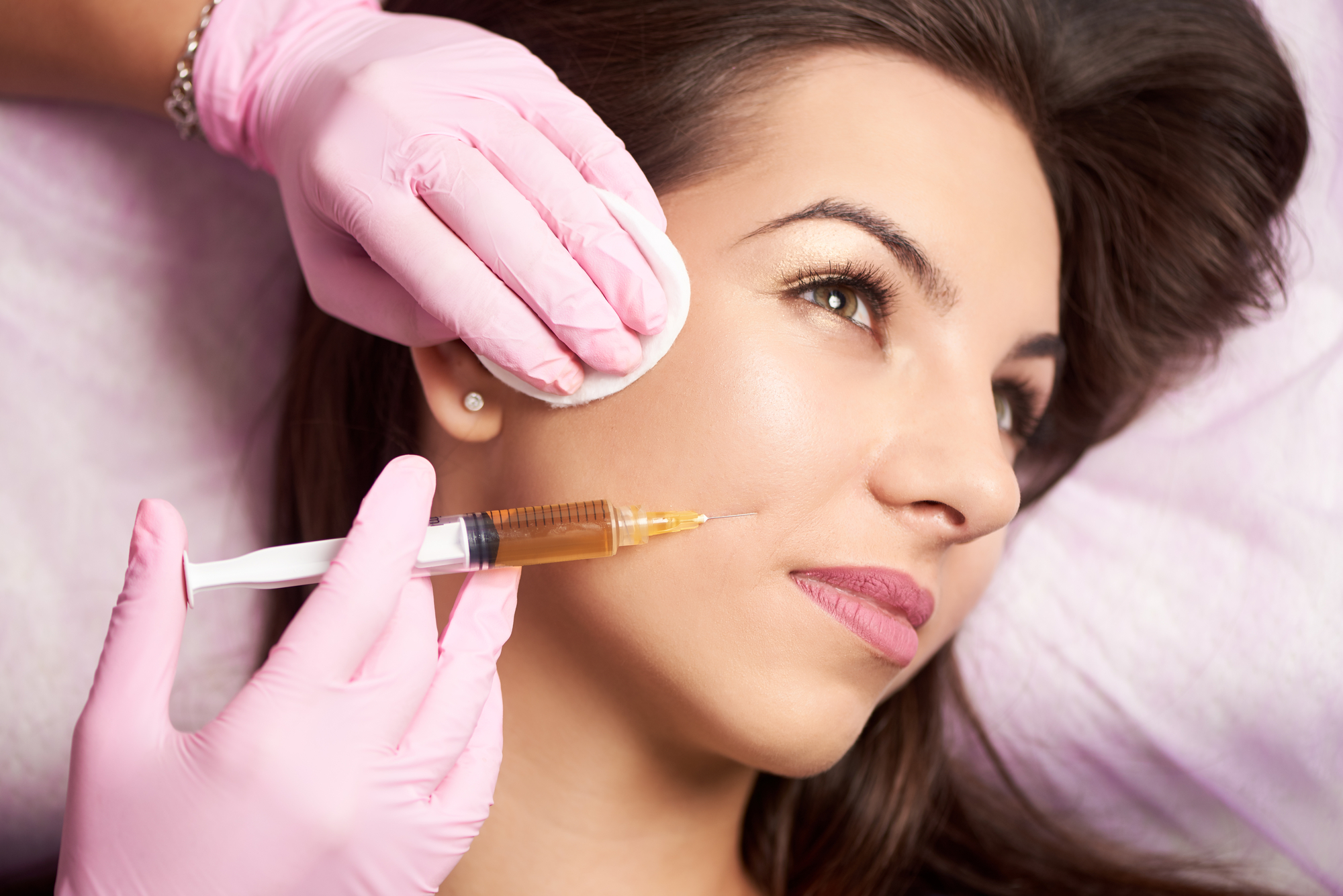 Dermal fillers, such as cheek fillers, inject a substance into the skin to plump it up and reduce the appearance of wrinkles.